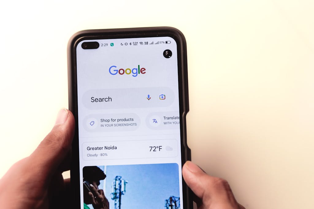 Men typing in the Google search engine from realme 6 pro. "Google" is the number one search web.